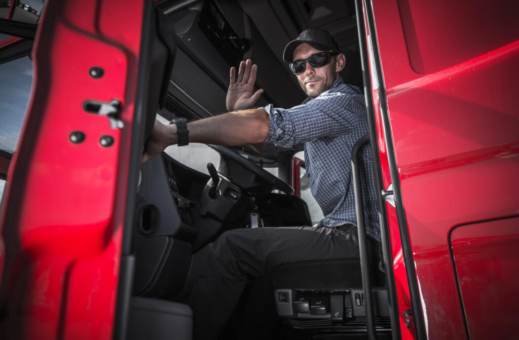 trucker in cab of truck